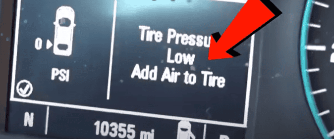 car dashboard notification for flat tire in an enterprise car rental